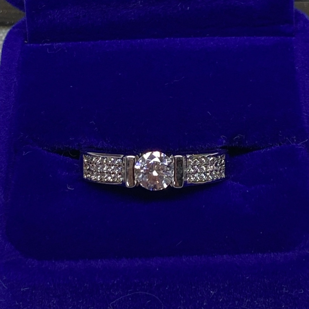 Elegant Sterling Silver Diamond Ring with Sparkling Accents